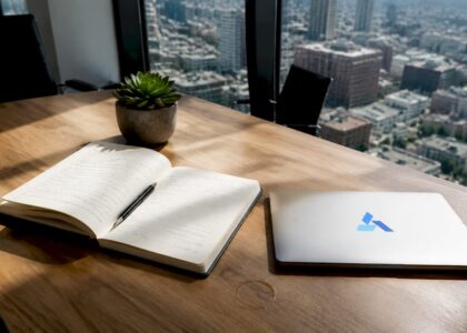 Business analytics workspace with Blue Prysm branded laptop