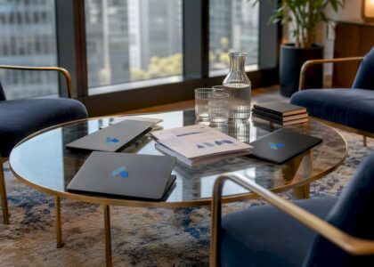 Conference table with sales strategy materials and Blue Prysm logos